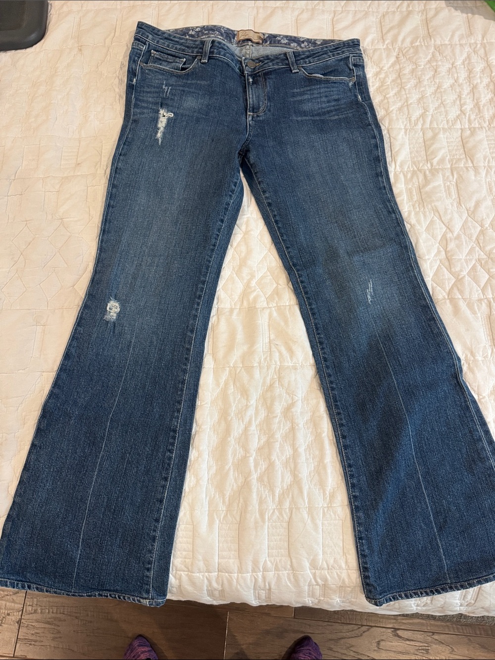 PAIGE Dark Blue Bootcut Jeans with Subtle Distressing